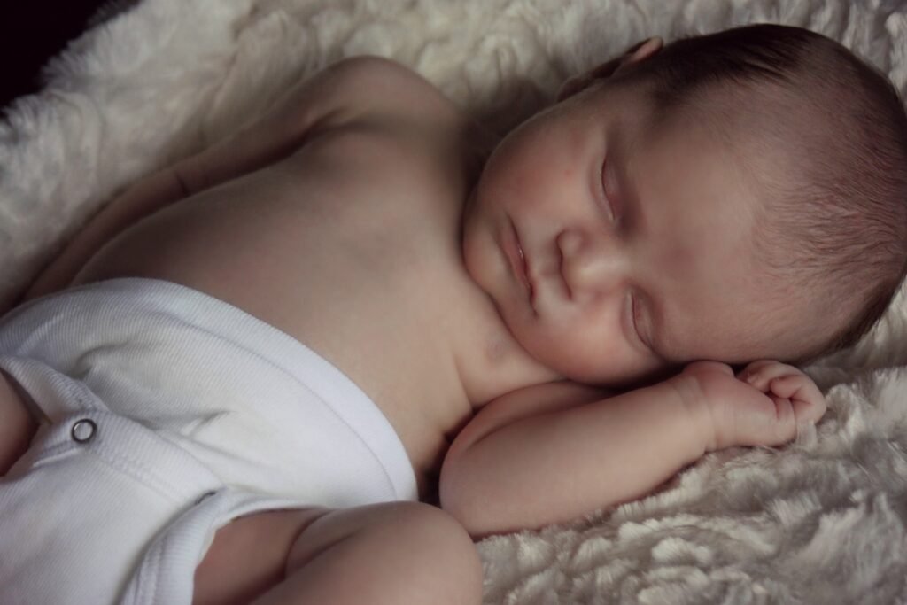 baby sleeping soundly. the importance of sleep at every stage of life.