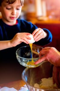 child preparing meals